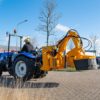 Herder-Fermex SC-550H stronkenfrees op New Holland tractor