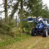 Aanbouwframe Puma 2803 met zaagunit Greentec op New Holland tractor