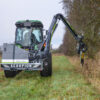 Maaiarm Scorpion 430 S PLUS met zaagunit Greentec op John Deere tractor - armmaaier voor achter of frontmontage